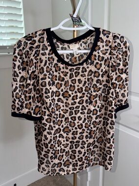 25. A New Day Leopard Print Sheer Top